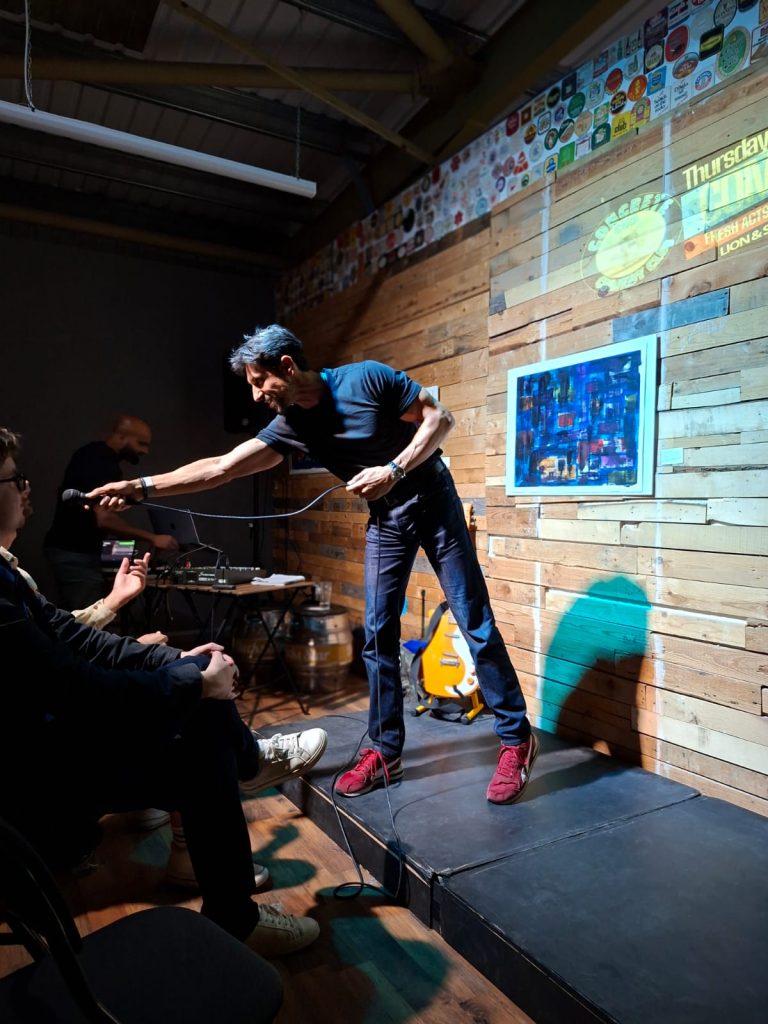 Ben performing stand-up at the Concrete Cud
